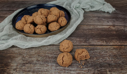 Homemade cinnamon cookies on wooden background
