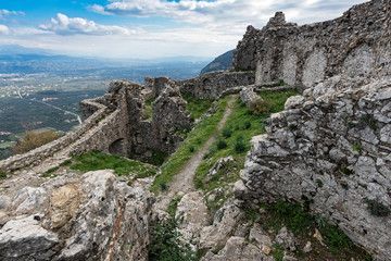 Fototapeta na wymiar Part of the byzantine archaeological site of Mystras in Peloponnese, Greece. View of the remains of the VillehardouinÕs Castle, the ancient citadel of the city