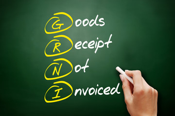 GRNI - Goods Receipt Not Invoiced acronym, business concept on blackboard
