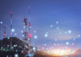 Telecommunications tower city at night .communication concept