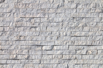 Background, wall texture of white natural stone