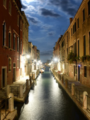 Venetian canal Rio de la Fornace at night in Venice, Italy.