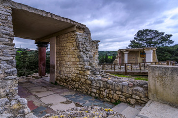 Knossos Palace, Crete / Greece. South Entrance, Corridor With The Prince Of The Lilies fresco at the archaeological site of Knossos. South Propylaeum building in the background.