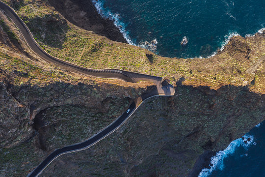 Curving road through desert landscape