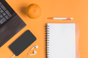 Creative concept. Desktop, freelancer, businessman, student. Laptop, workbook, smartphone, pen,...
