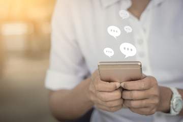 woman hand use smart phone, Chatting and messaging concept