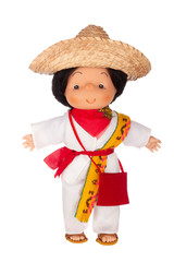 Doll in traditional Mexican outfit. Rag doll in colorful traditional clothes of Mexican people isolated on white background