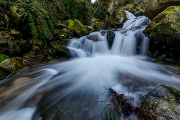 Fototapeta na wymiar Photo of milky water stream in himalayas - waterfall