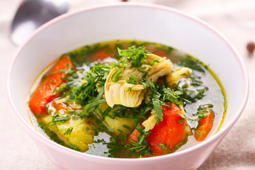 homemade soup with chicken and vegetables. closeup