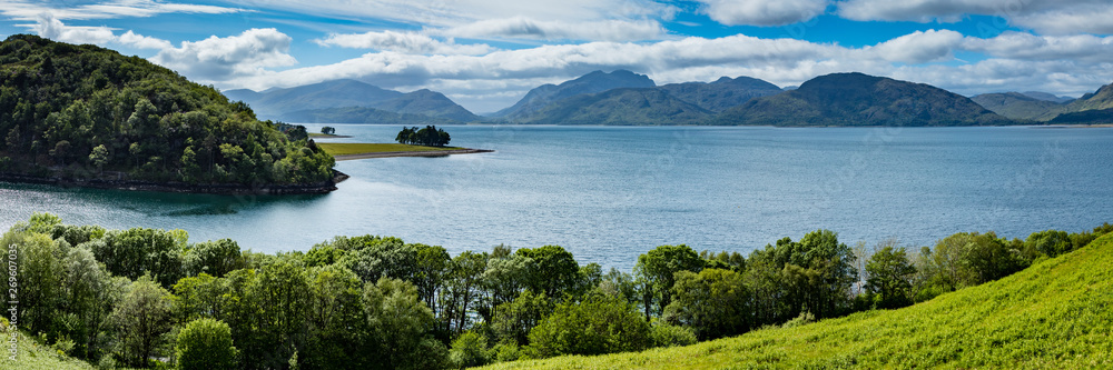 Wall mural panoramic view of kentallen bay with loch linnhe and the ardnamurchan peninsula in the argyll region of the highlands of scotland on a blue spring day