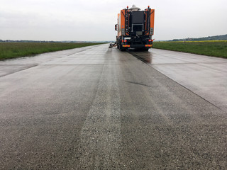 Picture of a truck with equipment for removal of the traffic marking from the road. It is made by...