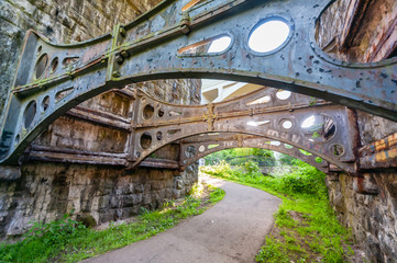 Iron braces on the supports of a Victorian viaduct.