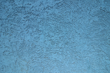 Blue wall in the sunlight. Modern building materials for exterio