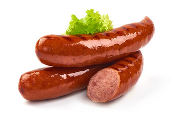 Grilled pork sausages with lettuce, close-up, isolated on white background