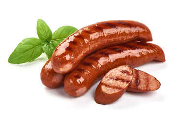 Grilled bratwurst Pork Sausages with basil leaves, close-up, isolated on white background - obrazy, fototapety, plakaty