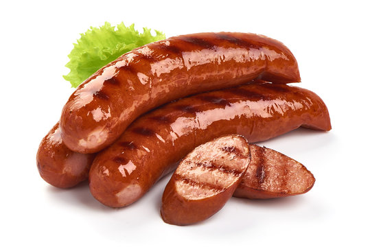 German grilled pork sausages with lettuce, close-up, isolated on white background