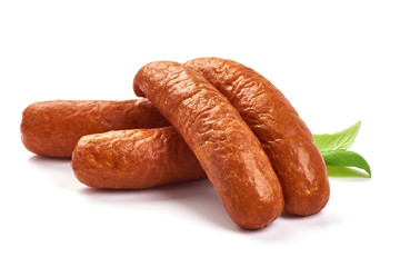 German traditional smoked sausages with basil leaves, dry meat, close-up, isolated on white background