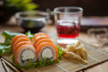 sushi and rolls on the table with soy sauce ginger