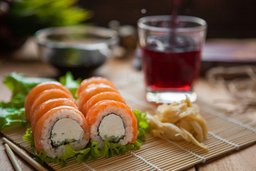 sushi and rolls on the table with soy sauce ginger