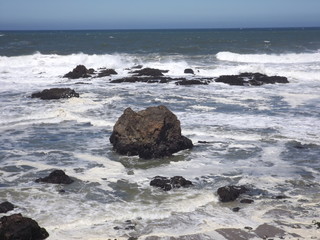 Lone Boulder in Ocean