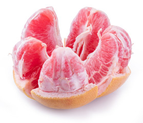 Peeled grapefruit slices isolated on white background.