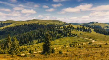 Obraz premium A magnificent panorama of the mountains with perfect sky. Awesome alpine highlands in sunny day. impressively beautiful Romania. Picture of wild area