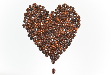 heart made of coffee beans isolated on white