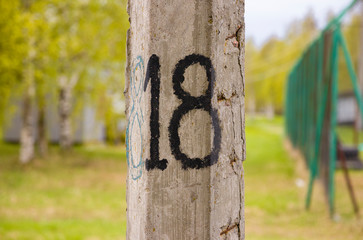 pole on the street number 18