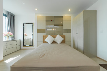 Fototapeta na wymiar Modern interior design in small apartment with bedroom.