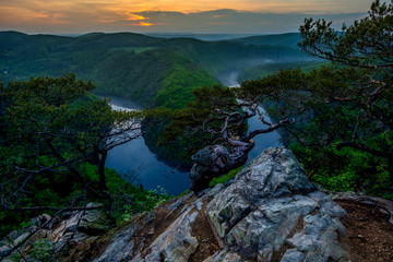 Landscape of canyon with river in sunset