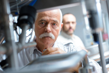 senior in working in logistics warehouse store