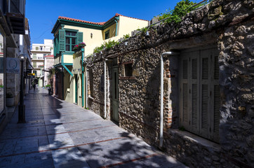 Heraklion, Crete Island / Greece. Narrow paved alley with traditional colorful houses at the center of Heraklion city