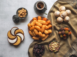 Ramadan sweets are laid out on the table. Top view