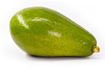 Exotic fruit perfect for advertising use. Typical Brazilian fruit known as avocado, in isolated background in high resolution photo.