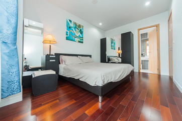 Naklejka na ściany i meble Modern bedroom in luxury apartment