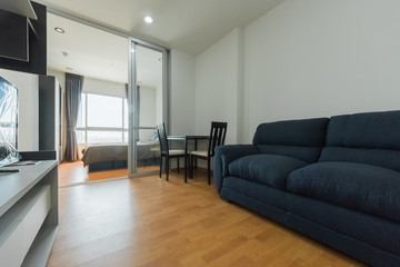 Naklejka na ściany i meble Modern living room and kitchen in small apartment