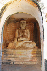Old Buddha statue at Pho Win Taung Caves, Monywa city, Sagaing State, Myanmar, Asia.