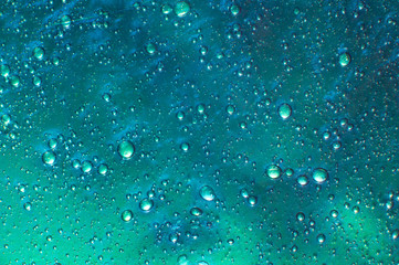 Naklejka na ściany i meble Textured mint background slime with air bubbles inside