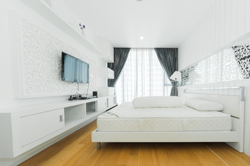 Warm bedroom interior with a comfy bed,
