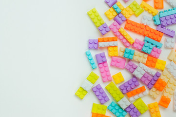 Closeup of kids toy blocks on white background with copy space
