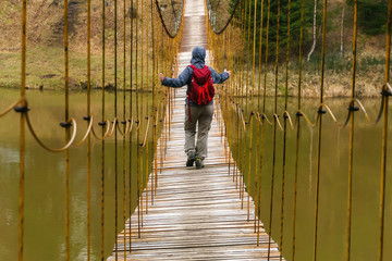 the way over the hanging bridge over the spring river