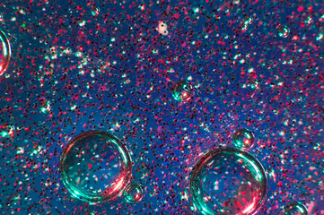 Abstract background transparent slime with bubbles and glittering particles