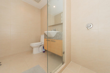 Toilet bowl in modern bathroom interior
