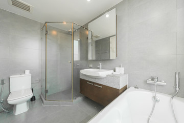 Toilet bowl in modern bathroom interior