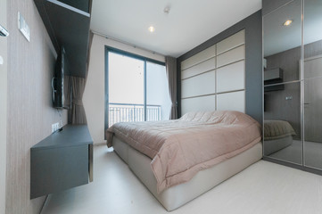 White comfortable pillow on bed decoration in hotel bed room 