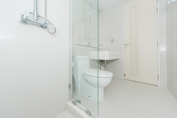 Toilet bowl in modern bathroom interior