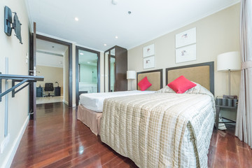 King-size bed in bright bedroom