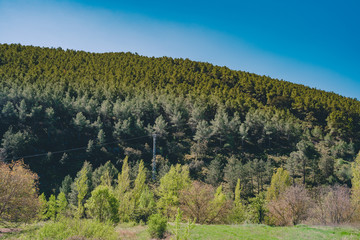 Spanish scenery,hills and blue sky. Mediterranean landscape, woods and mountains. Pines.