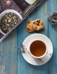lavender cup of tea on the wood blue table magazine breakfast  provence top view