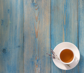 lavender cup of tea on the wood blue table breakfast  provence top view pure